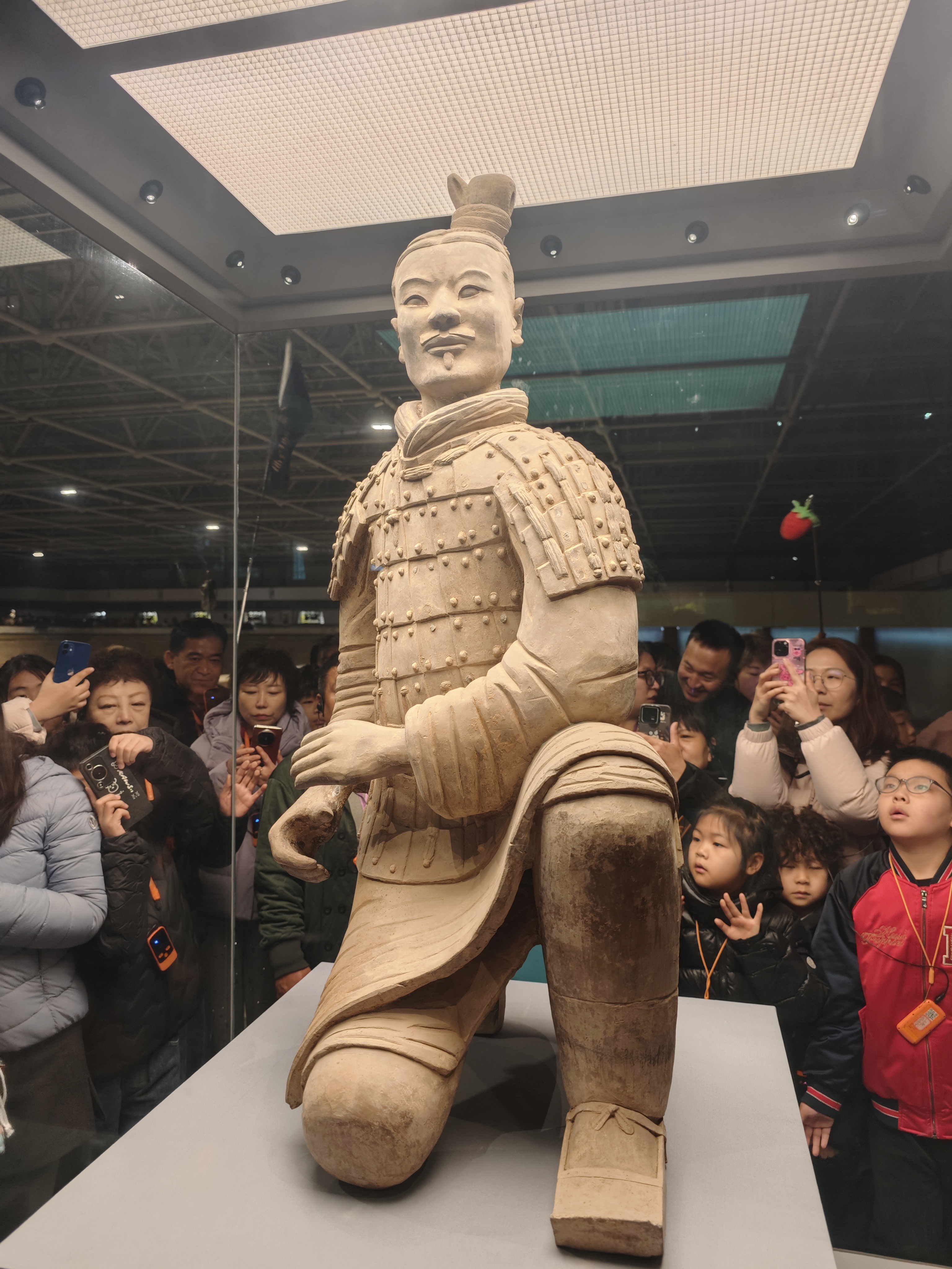 A squatted terra-cotta Warrior, displayed at Emperor Qinshihuang's Mausoleum